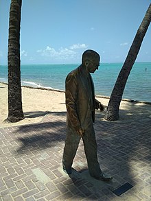 Bronze sculpture of Graciliano Ramos located on the beach of Ponta Verde in Maceió, Alagoas