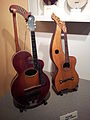 Early 20th. Century harp guitars with a Gibson at left.