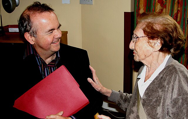 Hislop chatting with a resident at Nightingale House, Wandsworth Common, London, 2008