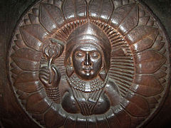 Female Figure holding a Lotus