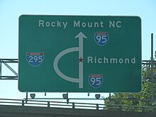 Overhead sign along Interstate 95 displaying Interstate 295 as a bypass route for Richmond, Virginia Interstate 95 - Virginia (8112215303).jpg