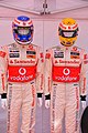 Jenson Button and Lewis Hamilton's racing helmets and overalls (4795006428).jpg