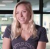 Television screenshot of Jessica Long ewearing a purple T-shirt