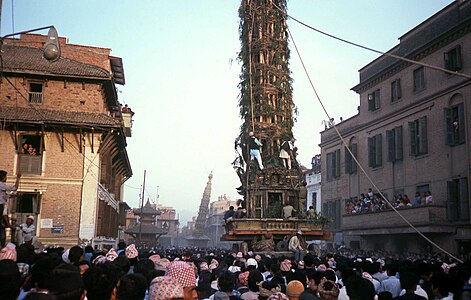 Religous procession in Katmandu, with two chariots representing gods. The name of the festival has to be found.