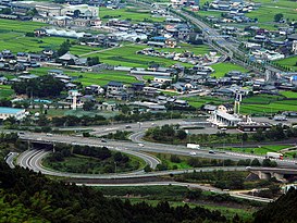 Nút giao thông Kawauchi và một góc thành phố Tōon, tỉnh Ehime.