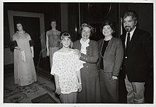 Lady Bird Johnson visits the National Museum of American History First Ladies Hall with granddaughter Claudia (left), and museum employees Edith Mayo and Manuel Melendez (on right), 1987 Lady Bird Johnson visits First Ladies Hall.jpg