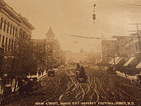 Postcard looking south on Main Street in 1909 Magic City Harvest Festival.jpg