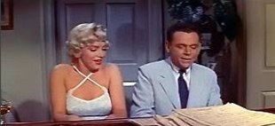 Marilyn Monroe and Tom Ewell in the Seven Year Itch (1955) trailer Marilyn Monroe and Tom Ewell in The Seven Year Itch trailer 2.JPG