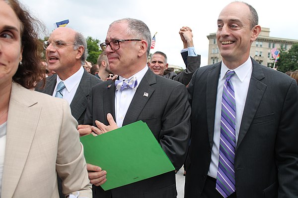 Outside the Supreme Court on the morning of June 26, 2015, James Obergefell (foreground, center) and attorney Al Gerhardstein (foreground, left) react