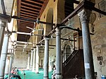 The prayer hall, with the mihrab and minbar visible on the right, along the qibla wall