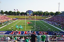 The 2017 North Texas football team taking the field before the game against SMU North Texas vs. Southern Methodist football 2017 04 (North Texas entrance).jpg