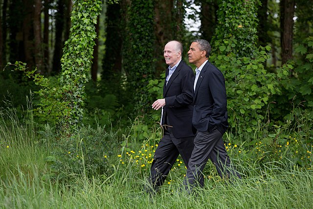 President Barack Obama walks with National Security Advisor Tom Donilon on the grounds of Lough Erne Resort at the conclusion of the G8 Summit in Enni