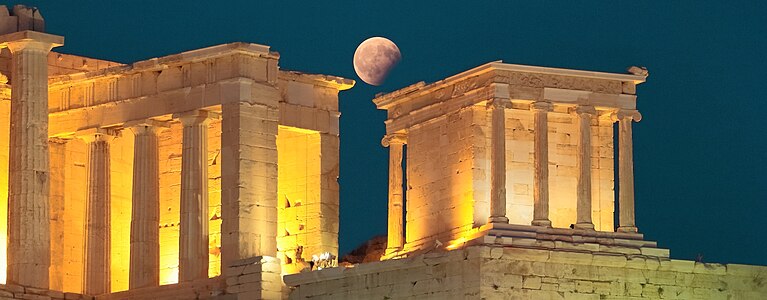 Partial lunar eclipse over Acropolis of Athens,Temple of Athena Nike Creator: Ranssom