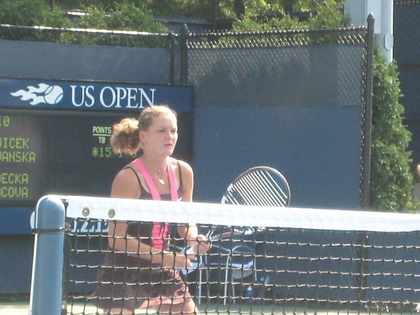 Agnieszka Radwańska reached her first Wimbledon quarter-final by defeating Svetlana Kuznetsova in the fourth round