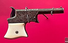 Nineteenth Century Remington Vest-Pocket Pistol No. 1, .22 caliber, on display at the Cody Firearms Museum, Buffalo Bill Center of the West Cody, Wyoming. RemingtonVestPocketNo1.jpg