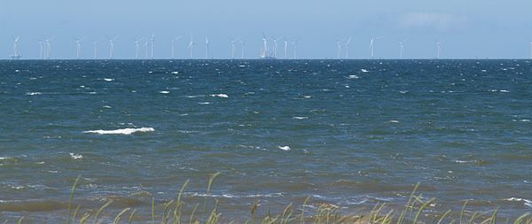 Robin Rigg wind farm (pictured here while still under construction in 2009) has proven controversial with residents and supporters of the AONB.