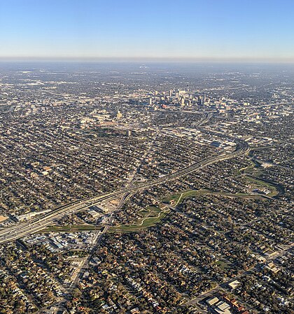 Aerial view from the northwest of San Antonio, with I-10, Frederickburg Road, and Martinez Creek in foreground
