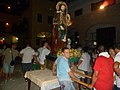 El santo llevado en procesión por las calles de la ciudad, durante la procesión del 23 de agosto de 2012