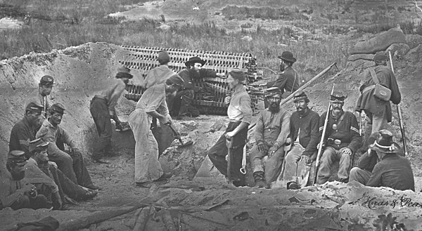 Sappers of the 1st New York engineer regiment digging a sap with sap rollers towards the fortifications of Fort Wagner, September 1863