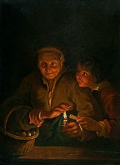 Vieille femme et garçon avec des bougies.