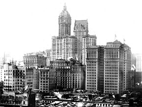 View from the north with the Hudson Terminal (right), the Singer Building (middle back, the tallest structure) and the City Investing Building (middle front, slanted roof on tallest extension) Singer City Investing Hudson Terminal 1909 crop.jpg