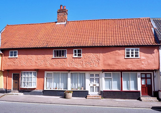 16th century cottage in Ixworth, with pargetting and traditional Suffolk Pink limewash