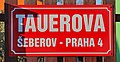 Čeština: Nestandardní cedule s označením Tauerovy ulice v Šeberově v Praze 11 English: Tauerova street, sign, Prague.