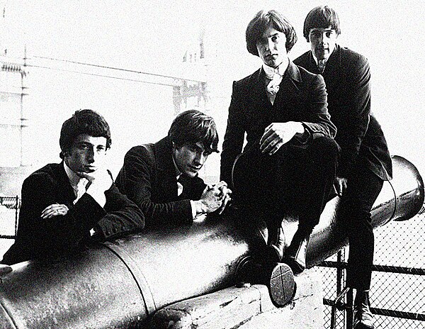 The Kinks in their red jackets, near Tower Bridge, London, August 1964