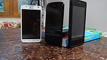 LG Optimus L7 II (P715) along with HTC Desire 500 and Qmobile Noir A500 Three smartphones HD.JPG