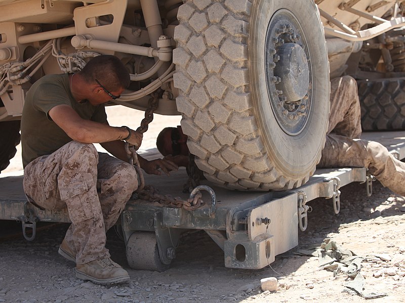 File:Two U.S. Marines, with 2nd Maintenance Battalion, 2nd Marine Logistics Group (Forward), hook chains onto a lift so they can tow a damaged vehicle at Forward Operating Base Edinburgh, Afghanistan, June 20, 2011 110620-M-UV027-052.jpg