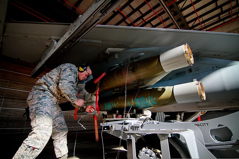 File:U.S. Air Force Airman 1st Class Andrew Finnegan, an aircraft armament systems specialist assigned to the 177th Aircraft Maintenance Squadron, 177th Fighter Wing, New Jersey Air National Guard, attaches a GBU-12 140109-Z-NI803-761.jpg