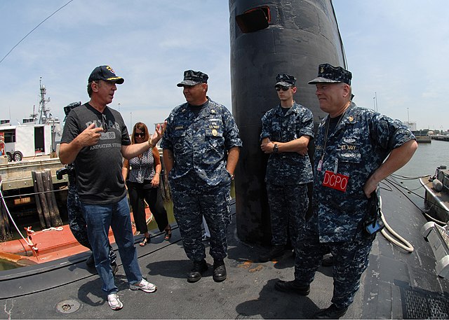 Allen (left) with members of the United States Navy, 2010