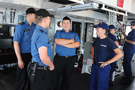 US coast guardsmen and Canadian navy sailors working together
