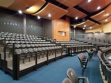 The auditorium of the new main building has 580 seats. W.H. Adamson High School auditorium.jpg