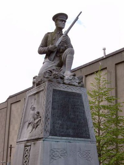 An Irish Volunteer atop a memorial to the Irish War of Independence in Dublin by Leo Broe