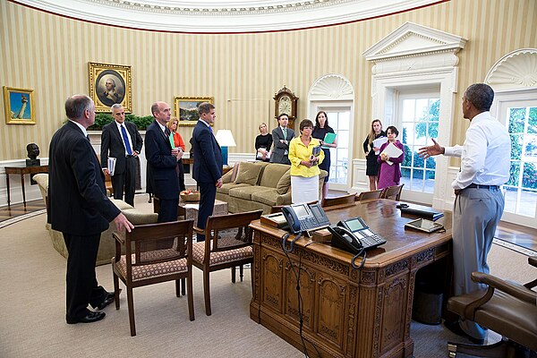 Ricchetti (left) in the Oval Office with senior White House advisors, 2014