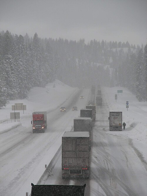 A queue of trucks on a section of I-84 near Meacham, waiting to install snow chains