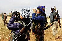 Kurdish YPG's female fighters during the Syrian War YPJ fighters Raqqa (February 2017).jpg