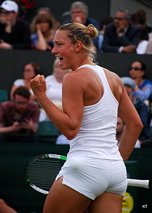 Wickmayer during day 3 of the 2014 Wimbledon Championships Yanina Wickmayer (14523910966).jpg