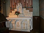 L'autel et le tabernacle en marbre blanc