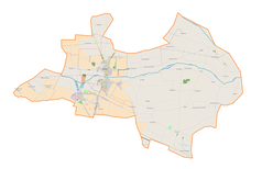Mapa konturowa gminy Żychlin, blisko centrum na lewo znajduje się punkt z opisem „Parafia Świętych Apostołów Piotra i Pawła”