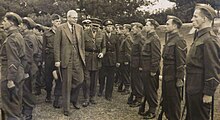 Secretary of State for the Colonies Oliver Stanley inspects the Bermuda Volunteer Rifle Corps at Prospect Camp, 30th December, 1944. 1944-12-30 Secretary-of-State for the Colonies Oliver Stanley & Bermuda Volunteer Rifle Corps at Imperial Fortress of Bermuda.jpg