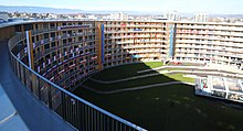 The circular "Vortex" building which houses the Olympic village on the Lausanne campus (it will later become a student residence). 2020-01-09 Media Tour Youth Olympic Village Lausanne (2020 Winter Youth Olympics) by Martin Rulsch 79.jpg