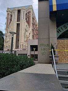 Boarded exterior and mural damage following vandalism to the Oregon Historical Society 20201012 OHS.jpg