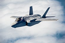 F-35A moving into position to refuel A U.S. Air Force pilot navigates an F-35A Lightning II aircraft assigned to the 58th Fighter Squadron, 33rd Fighter Wing into position to refuel with a KC-135 Stratotanker assigned to the 336th Air Refueling 130516-F-XL333-505.jpg