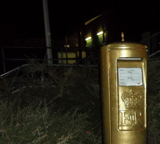 File:Aled Davies's gold post box at the Broadlands District Centre, Bridgend, Mid Glamorgan (1).jpg