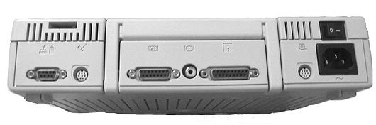 The rear expansion ports. Note the standard AC-power connector and smaller mini DIN-8 serial ports. Apple IIc Plus (back).jpg