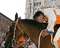 The jockey Jonatan Bartoletti (nicknamed "Scompiglio") kissing the horse Brento after winning for Leocorno the Palio of August 16th 2007