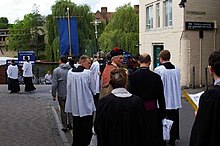 Beating the Bounds in Mill Lane, Cambridge. The clergy and people of Little St Mary's Church annually walk round the boundaries of the parish, singing hymns and psalms and praying for blessings on the residents and their activities. Beating the Bounds in Mill Lane - geograph.org.uk - 440810.jpg