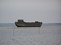 Į Vismaro įlankos krantą išmestas gelžbetoninis laivas